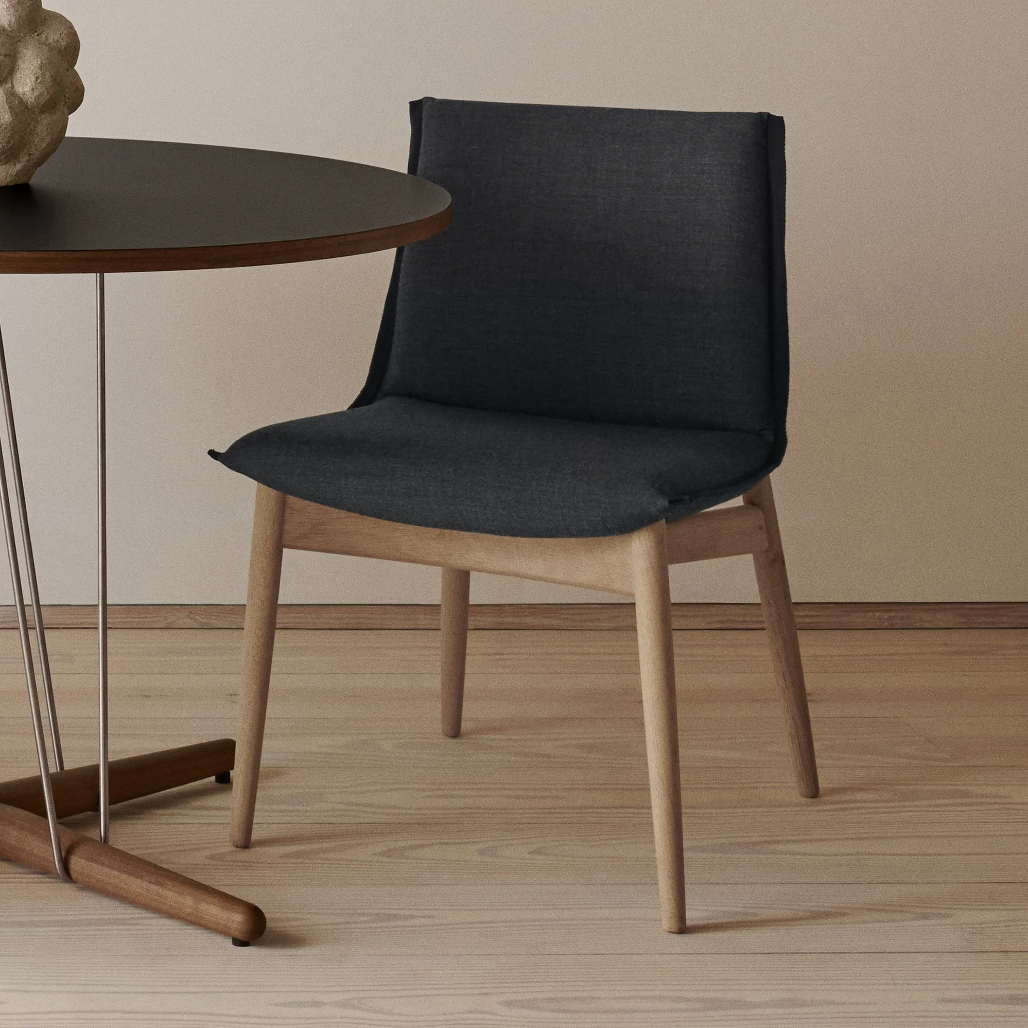 E004 Embrace Armless Chair